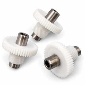 three white compound gears in triangle